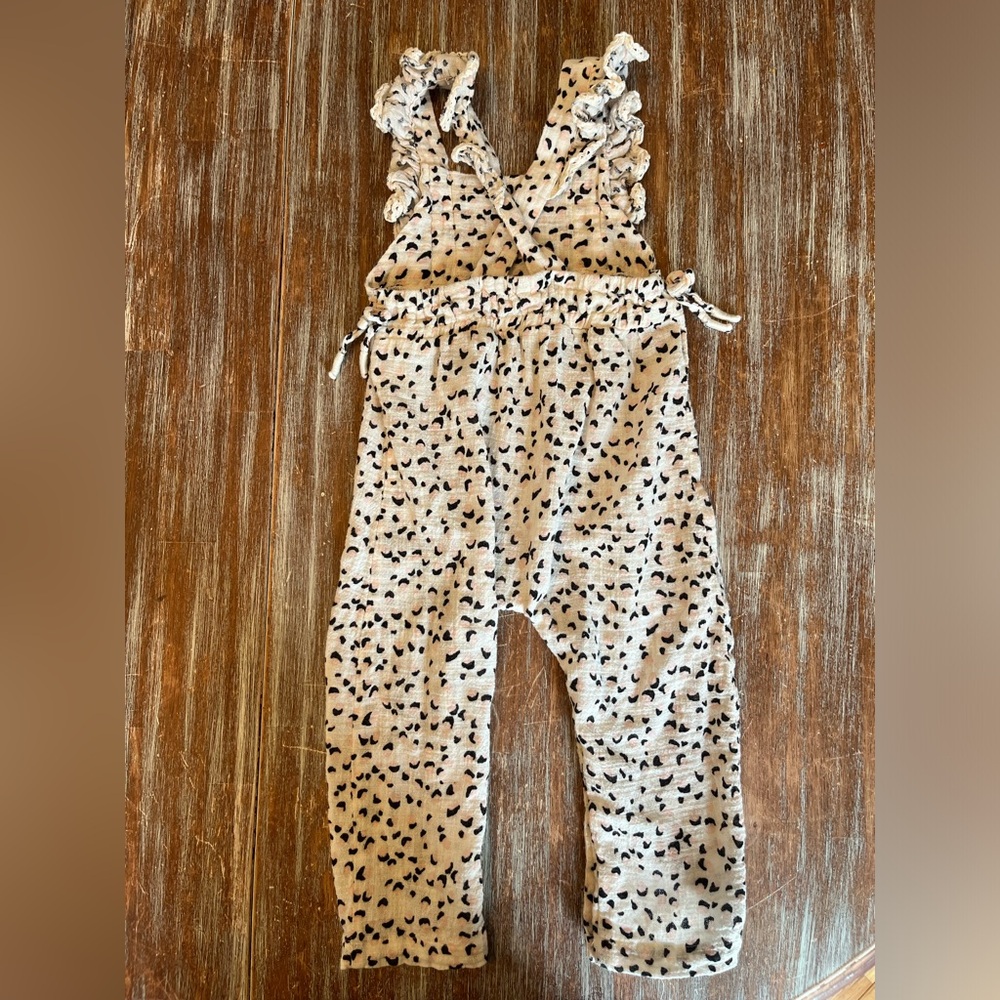 Lightly worn Jessica Simpson romper. Size 24 months.